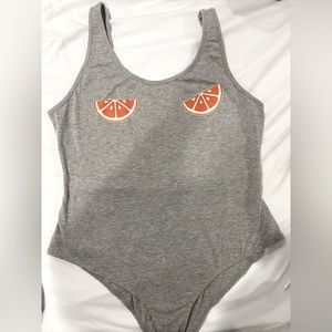 Grey bodysuit with oranges